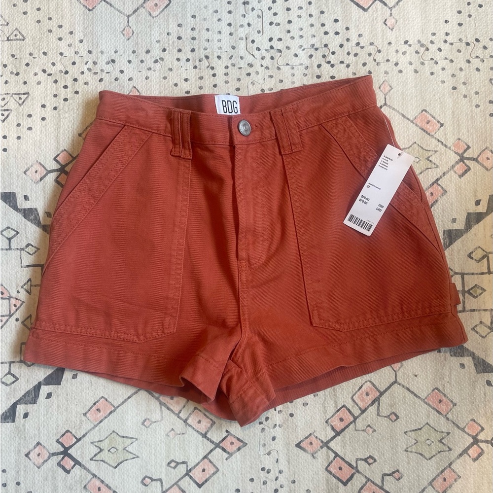 Size 27 BDG orange mango colored denim jean shorts.